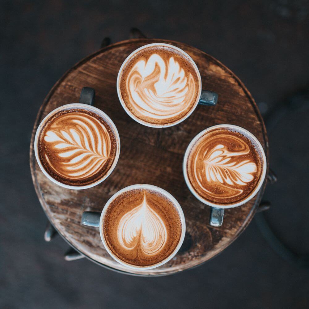 4 cups of latte art work with the foam