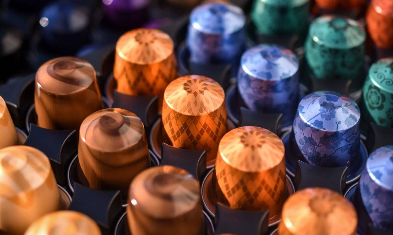 close up of nespresso pods in multiple colors and flavors