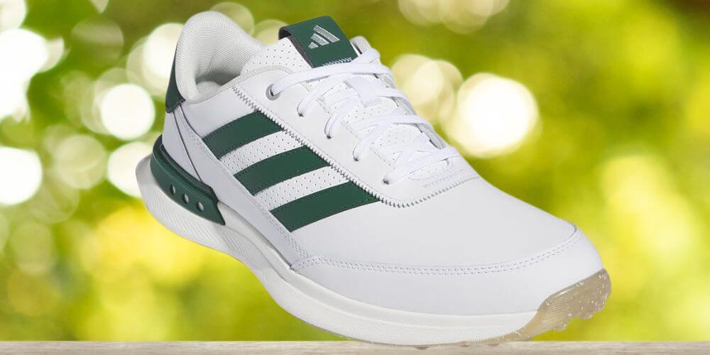 green and white adidas golf shoe